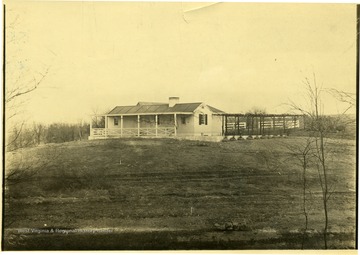 'The first completed house inspected at the time by Mrs. Roosevelt. The following credit must be printed underneath each reproduction of this picture; Paragon Photo Service, Not to be syndicated, rented, loaned or used for advertising purposes without written permission. Paragon Photo Service, 439 Fifth Ave., New York, N.Y.'