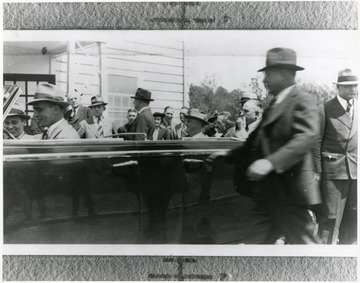 Large crowd gathers around car with FDR and others in Arthurdale W. Va.