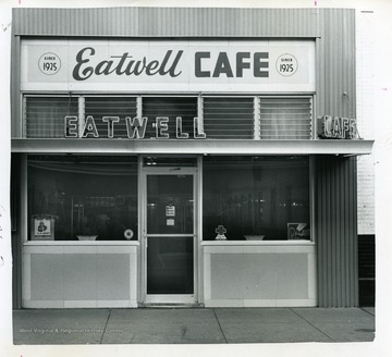 View of the entrance to the Eatwell Cafe in Beckley, West Virginia. Established in 1925, Eatwell Cafe is the oldest eating spot in Beckley at that time.