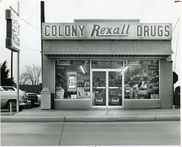 Outside the Colony Rexall Drug Store, 500 South Oakwood Ave., Beckley, W. Va.
