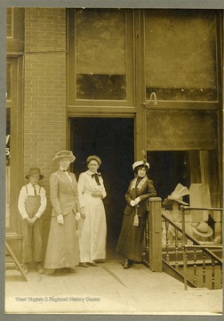 'Ray Quesenberry, Mrs. A.B. Maxwell at her millinery next to Beckley Drug, and Elizabeth Raybound, Mrs. Maxwell's younger half-sister.'