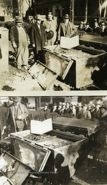 Men view the contents of a safe that survived the Capitol fire.  Letter attached to photographs reads, '18 April 1946 Dear Doctor Cook:  The gentleman on my right in the enclosed picture is I. Wade Coffman and the one on my left is the late James J. Divine, chairman and member respectively of the Public Service Commission in 1927.  The safe contained various records of the Commission.  The records were in good condition despite having been subjected to the terrific heat of the 'Pasteboard' Capitol fire.  It was thoughtful of you to send this picture to me for I don't recall having seen it before.  And of course I appreciate your choice adjectival selection for identifying me!  Sincerely, C. E. Nethken Chairman Public Service Commission of West Virginia'