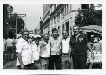 Several men pose for a group picture during the 1st Annual Italian Heritage Festival, Clarksburg, West Virginia.