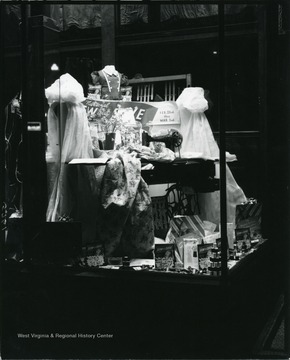 Sewing display in a store window in Grafton, W. Va.