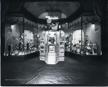 Large window display for Air Step shoes and a Strand Theatre Display  in Grafton, W. Va.