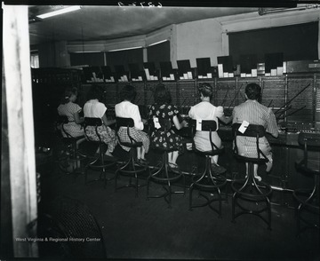 Six telephone operators are working in Grafton, West Virginia.