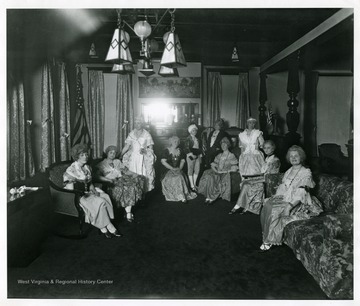 Ladies Aid Society members in costume sit for a group portrait at Andrew's Methodist Episcopal Church in Grafton, West Virginia.