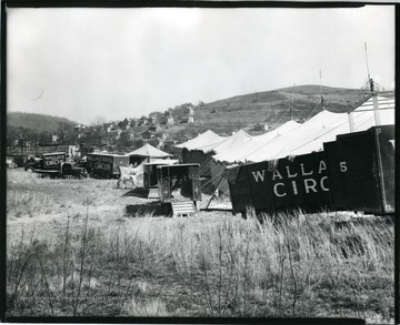 Tents and trucks belonging to the Wallace Brothers Circus at the Old Fairground on Riverside Drive in Grafton, West Virginia.
