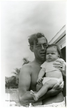 Rush D. Holt holding his first child, Helen J. Holt.