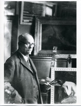 George Blaney is painting a picture in this studio.