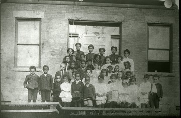 Students stand for a group portrait.
