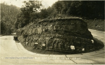 A U-shaped curve cut into the earth on Rt. 50.