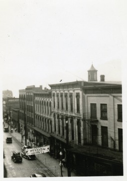 Street and surrounding buildings in Grafton, W. Va.  Banner advertising Hussion for Senate.