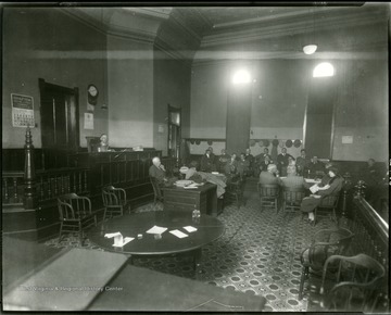 People sitting in the court room of the Taylor County Court House, Grafton, W. Va.