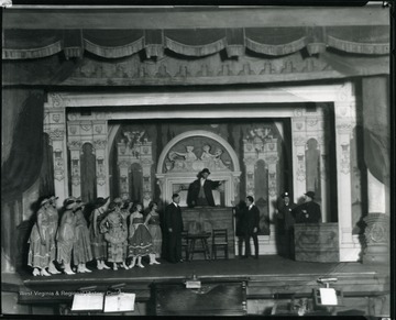 Performers are acting in a dramatic show.