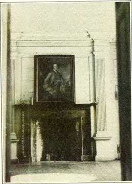 'The handsome porphyry mantel was a present sent to General George Washington by General Lafayette from France.  The portrait over the mantelpiece is that of Colonel Samuel Washington.  In this drawing room in 1794 Dolly Payne Todd became the wife of James Madison, later President of the United States.'