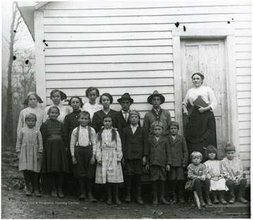 Bertha Engler taught at Fairview School, Subdistrict number 7 in Randolph County, during the winter term 1905-1906.  The school and date of this photograph is nknown.