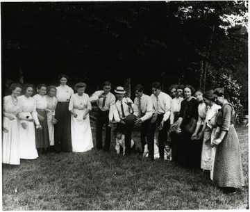 Group lined up and passing around a ball at Helvetia, W. Va. 