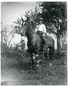 Bill Sutton sitting on a horse in a field in Helvetia, West Virginia.