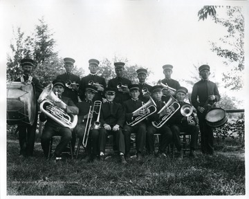 Members of the Helvetia Brass Band with their instruments.