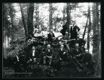 Musicians and others on an outcropping in the forest near Helvetia, West Virginia.
