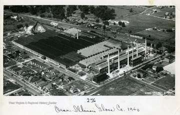 An aerial view of the Owens-Illinois Glass Company in Huntington, West Virginia; 'Aerial Photograph no. 1520 by Aero-Graphic Corporation, Bowman Field, Louisville, Kentucky. Please show credit line Aero-Graphic Corp. Photo wherever this picture is published or reproduced.'
