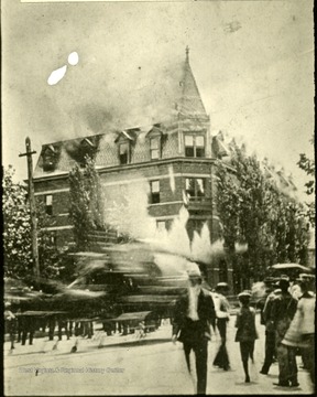 'Burning of old Hotel Adelphi, S. E. corner of 6th Ave. and 9th St. Water Supply failed and no water to fight the fire.'