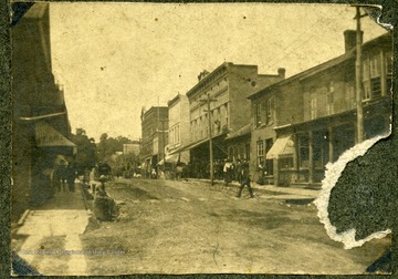 View of people walking on the sidewalks of downtown Lewisburg, W. Va.