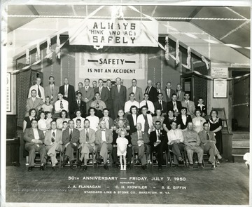 J.A. Flanagan, C. H. Kidwiler, and S.E. Giffin are honored for their safety record during the 50th Anniversary, Friday, July 7, 1950, Standard Lime and Stone Co., in Bakerton, West Virginia.