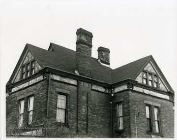 A close-up of the second story and roof of the Marshall House in New Cumberland, West Virginia.