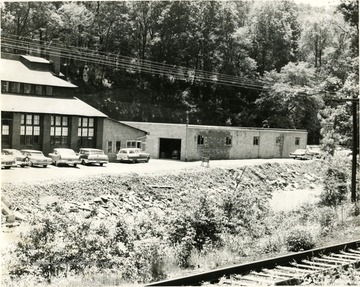 Shirt factory at Marilla in Morgantown, W. Va., located near railway tracks. Power lines span near the shirt factory. 