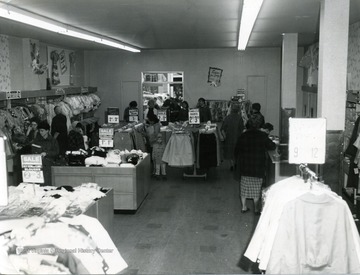 People shopping in Eleanor's Low-priced Clothing Store located in Morgantown, W. Va. 