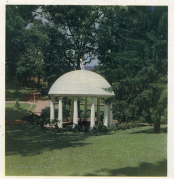 'Marking the site of the famous White Sulphur Springs, Greenbrier county, is this famed rotunda. It is located on the grounds of the Greenbrier hotel.'