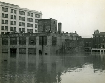 Flood waters engulf the Chevrolet Company building in Wheeling, W. Va. 