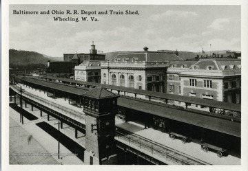 A picture postcard of the Baltimore and Ohio Railroad Depot and Train Shed in Wheeling, West Virginia.