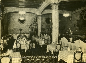 Interior view of the American Restaurant in Wheeling, W. Va. Tables are set with folded napkins on each table top. 