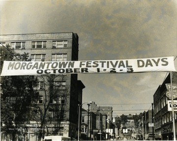 Banner strung across High Street to announce Morgantown Festival Days in Morgantown, W. Va. 