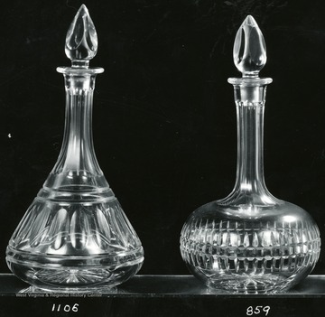 Two Seneca glass pieces numbered 1106 and 859.