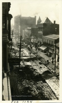Taken on the fourth floor of the Strand Building looking down at High Street completely dug up.  