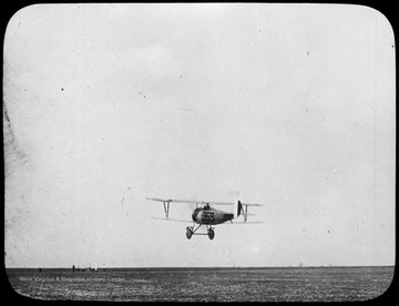 World War I Lantern Slide Show. In group of originally numbered slides.  (Number label is lost.)  Royal Flying Corps biplane taking off  (negative no. 26-10943 is inscribed on slide)