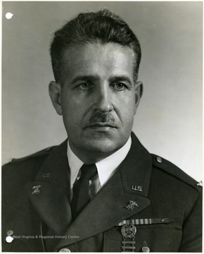 'Chief of the Operations Branch, Construction Division, Office of the Quartermaster General.  Watch your credit.  No objection to reproducing or publishing this picture provided credit line 'Photo By U. S. Army Signal Corps' appears on the photograph or page, except that written permission must be obtained from the War Department if it is desired for use in commercial advertising.'