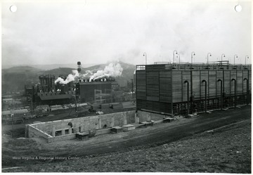 'U.S. Engineer Office, Corp of Engineers, U. S. Army, Pittsburgh, PA; Morgantown Ordnance Works, Morgantown, W. Va., Addition to water cooling tower No. 151 - Looking southeast.  E. I. Du Pont de Nemours and Company - Contract W Ord-490 - Contract Date 11-28-40.  Military Funds. February 25, 1943; No. 20584.'