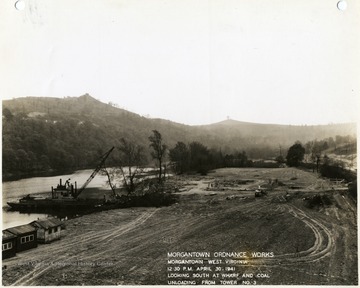 '12:30 P.M. April 30, 1941.  Looking south at wharf and coal unloading from tower No. 3. Photograph Number 127.'