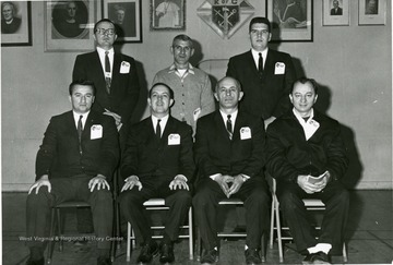 Group portrait of Knights of Columbus initiates. One member is 'Peter Guariglia'.