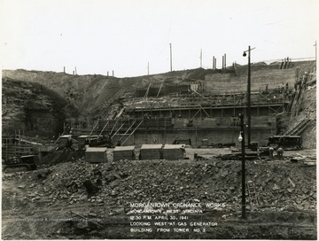 '12:30 P.M. April 30, 1941.  Looking West at gas generator building from tower No. 3.'