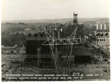 'Photograph No. 157; 4:00 P.M. on Sept. 30, 1941.  Looking east at electrical substation, factory building and boiler house from tower No. 1.'