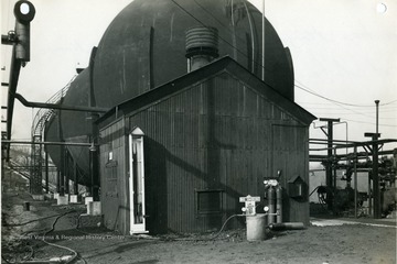 'United States Engineer Office. Corps of Engineers United States Army. Pittsburgh, Pennsylvania. Morgantown Ordnance Works-Morgantown, West Virginia: Ammonia Storage Compressor House-looking Northeast.  January 13, 1944. No. 21617.'