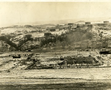 '3:00 P.M. March 17, 1941.  Taken from Tower No. 1.  Looking East, Foundation Work on Factory Building.'