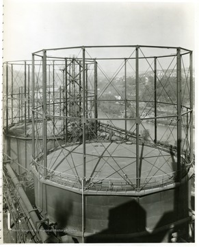 Blow Run and Blue Gas Holders, Buildings 121, 123, 124. View looking North. From Volume One of Morgantown Ordnance Plant Pictures at Morgantown, W. Va.  Constructed and Operated by the Ammonia Department, E. I. Dupont De Nemours and Company.
