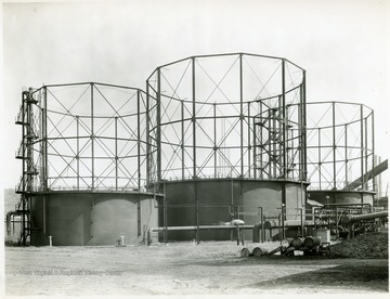 Blow Run and Blue Gas Holders, Buildings 121, 123, 124. From Volume One of Morgantown Ordnance Plant Pictures at Morgantown, W. Va. Constructed and Operated by The Amonia Department, E. I. Dupont De Nemours and Company.
